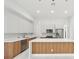 Modern kitchen with wood cabinets and island at 9516 President Cir, Port Charlotte, FL 33981
