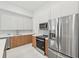Modern kitchen with stainless steel appliances and island at 9516 President Cir, Port Charlotte, FL 33981