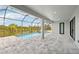 Spacious screened pool and patio with canal views at 9516 President Cir, Port Charlotte, FL 33981