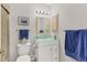 Small bathroom with a toilet, sink and shower at 10 Windward Ct, Placida, FL 33946