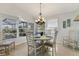 Bright dining room with a table, chairs, and chandelier at 10 Windward Ct, Placida, FL 33946