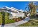 Inviting exterior with landscaped walkway leading to the entrance at 10 Windward Ct, Placida, FL 33946