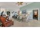 Bright living room with comfortable seating and coastal decor at 10 Windward Ct, Placida, FL 33946