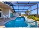 Enjoy this refreshing screened pool and patio at 10 Windward Ct, Placida, FL 33946