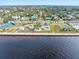 Aerial view of a waterfront park and residential neighborhood at 110 Chasteen St, Punta Gorda, FL 33950