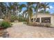 Outdoor patio with brick pavers and seating area at 110 Chasteen St, Punta Gorda, FL 33950