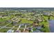 Community overview showcasing various homes and a lake at 1188 Paraclete Rd, Punta Gorda, FL 33983