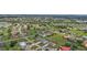 Aerial view of a residential community with lush green spaces at 1188 Paraclete Rd, Punta Gorda, FL 33983