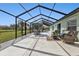 Screened pool area with patio furniture at 1188 Paraclete Rd, Punta Gorda, FL 33983