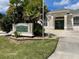 Woodhaven Estates Villas community entrance sign and building at 1347 Hedgewood Cir, North Port, FL 34288