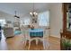 Dining area featuring a wood hutch and hardwood flooring at 1347 Hedgewood Cir, North Port, FL 34288