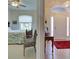 Bright entryway with a view into a bedroom and access to the front door at 1347 Hedgewood Cir, North Port, FL 34288