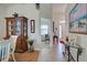 Hallway view into dining room and bedroom at 1347 Hedgewood Cir, North Port, FL 34288