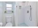 Clean bathroom with toilet and a walk-in shower at 148 Salem Nw Ave, Port Charlotte, FL 33952