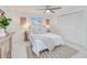 Bright bedroom with a queen-size bed and ample closet space at 148 Salem Nw Ave, Port Charlotte, FL 33952