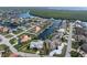 Aerial view of waterfront property, showcasing the home and surrounding canals at 1511 Casey Key Dr, Punta Gorda, FL 33950