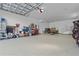 Spacious garage with ample storage and workshop area at 1511 Casey Key Dr, Punta Gorda, FL 33950