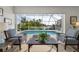 Living room with pool and water view at 1511 Casey Key Dr, Punta Gorda, FL 33950