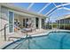 Relaxing pool and patio with access to indoor living space at 1511 Casey Key Dr, Punta Gorda, FL 33950