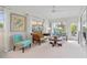 Main bedroom sitting area with comfy seating and natural light at 1511 Casey Key Dr, Punta Gorda, FL 33950