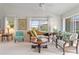 Relaxing sitting area in the main bedroom, near pool access at 1511 Casey Key Dr, Punta Gorda, FL 33950