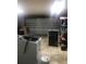 Garage with washer, dryer, and storage shelving at 15570 Rasmussen Rd, Punta Gorda, FL 33982