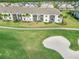 Aerial view of townhouses next to golf course at 15960 Grassland Ln # 2722, Punta Gorda, FL 33982