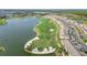 Aerial view of community by lake and golf course at 15960 Grassland Ln # 2722, Punta Gorda, FL 33982