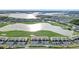 Aerial view of community with lake and golf course at 15960 Grassland Ln # 2722, Punta Gorda, FL 33982