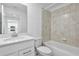 Clean bathroom with tub and white vanity at 15960 Grassland Ln # 2722, Punta Gorda, FL 33982