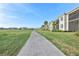 Community path bordering a lush golf course at 15960 Grassland Ln # 2722, Punta Gorda, FL 33982