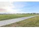 Scenic community view, showcasing green spaces and buildings at 15960 Grassland Ln # 2722, Punta Gorda, FL 33982