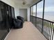 Screened balcony with patio furniture and bay view at 1601 Park Beach Cir # 136/18, Punta Gorda, FL 33950