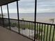 Spacious screened balcony overlooking water and pool at 1601 Park Beach Cir # 136/18, Punta Gorda, FL 33950