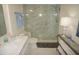 Bathroom with marble shower, vanity, and toilet at 1601 Park Beach Cir # 136/18, Punta Gorda, FL 33950