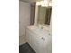 Bathroom with vanity, mirror and towel rack at 1601 Park Beach Cir # 136/18, Punta Gorda, FL 33950