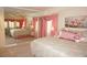 Bright bedroom with mirrored closet and floral bedding at 1601 Park Beach Cir # 136/18, Punta Gorda, FL 33950