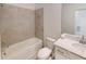 Bathroom with bathtub, toilet and vanity at 17565 Opal Sand Dr # 401, Venice, FL 34293