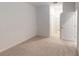 Bright bedroom with carpet flooring and access to a bathroom at 17565 Opal Sand Dr # 401, Venice, FL 34293