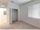 Bedroom with closet and window at 17565 Opal Sand Dr # 401, Venice, FL 34293