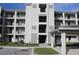 Condo building with multiple levels and balconies at 17565 Opal Sand Dr # 401, Venice, FL 34293