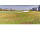 View of a lush green golf course at 17565 Opal Sand Dr # 401, Venice, FL 34293