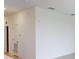 Bright hallway with neutral walls at 17565 Opal Sand Dr # 401, Venice, FL 34293