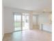 Living room with access to balcony and view at 17565 Opal Sand Dr # 401, Venice, FL 34293