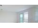 Living room with access to balcony and view at 17565 Opal Sand Dr # 401, Venice, FL 34293