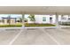 Covered parking spaces with easy access to building at 17565 Opal Sand Dr # 401, Venice, FL 34293