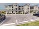 Covered parking area in front of a condo building at 17565 Opal Sand Dr # 401, Venice, FL 34293