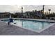 Community pool with ample deck space at 17565 Opal Sand Dr # 401, Venice, FL 34293