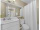 Clean bathroom with white vanity, shower, and toilet at 18086 Clanton Ave, Port Charlotte, FL 33948