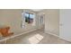 Bright bedroom with tile floors and window at 18086 Clanton Ave, Port Charlotte, FL 33948